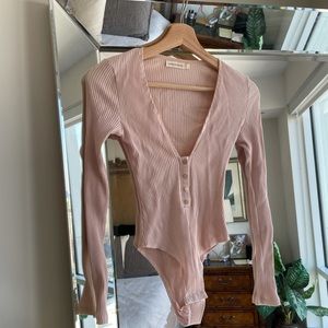 Plunge neck long sleeve blush bodysuit
